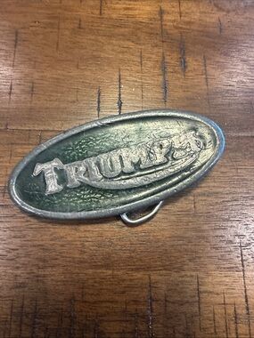 Vintage 1975 Triumph Motorcycles Green and Silver Oval Metal Accent Belt Buckle